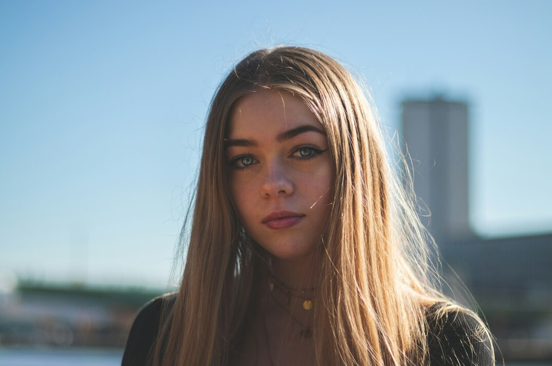 Portrait of a young woman with long hair