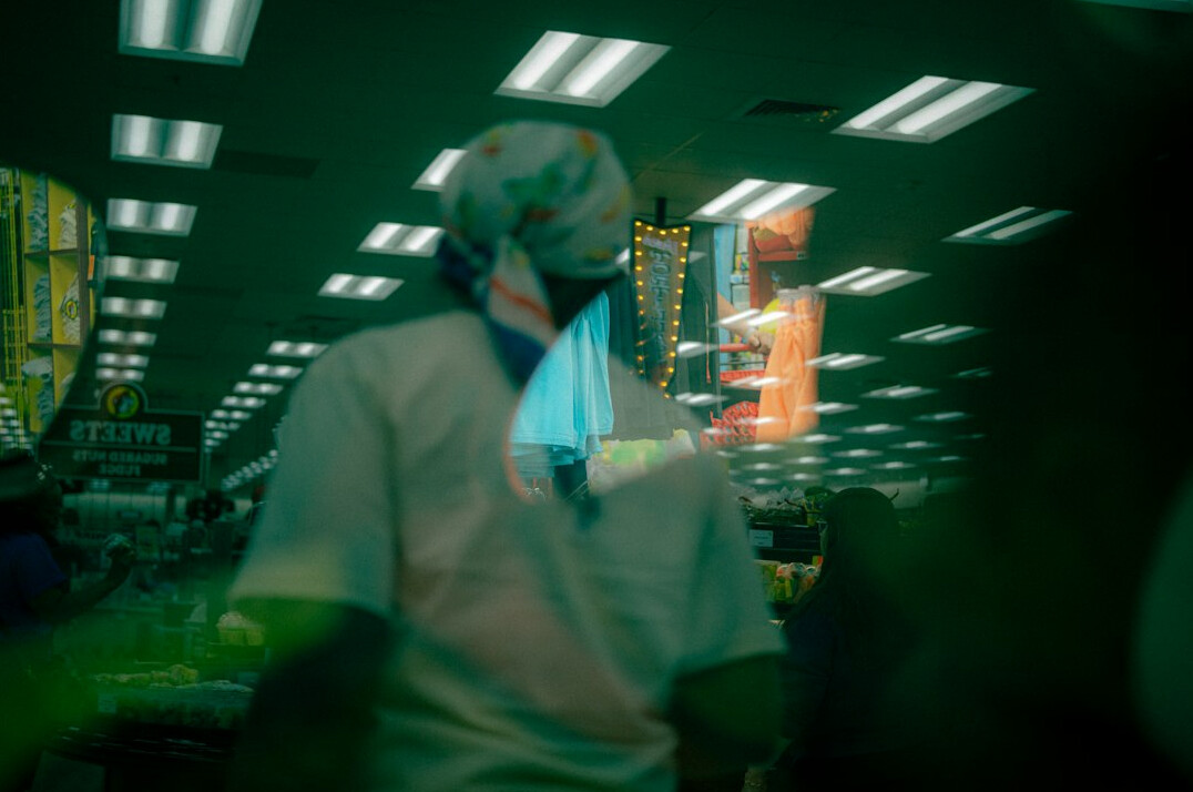store detective watching customers